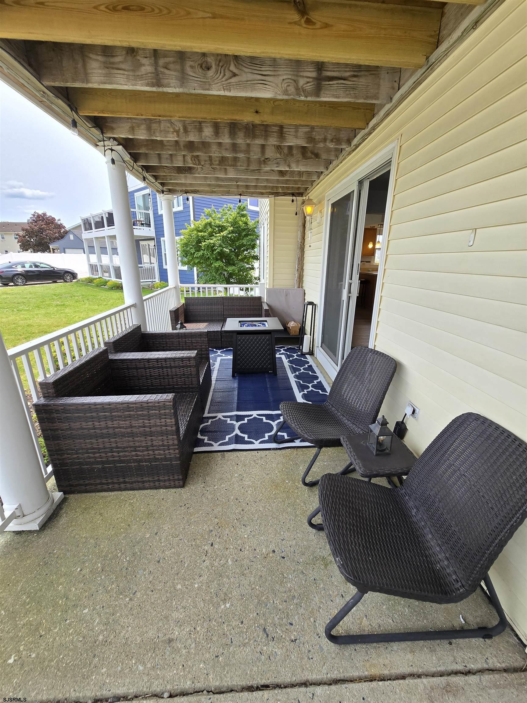 6 Lighthouse Cove, Unit A Brigantine, NJ 08203 - Photo 8 of 49 a view of a couches in patio of a house