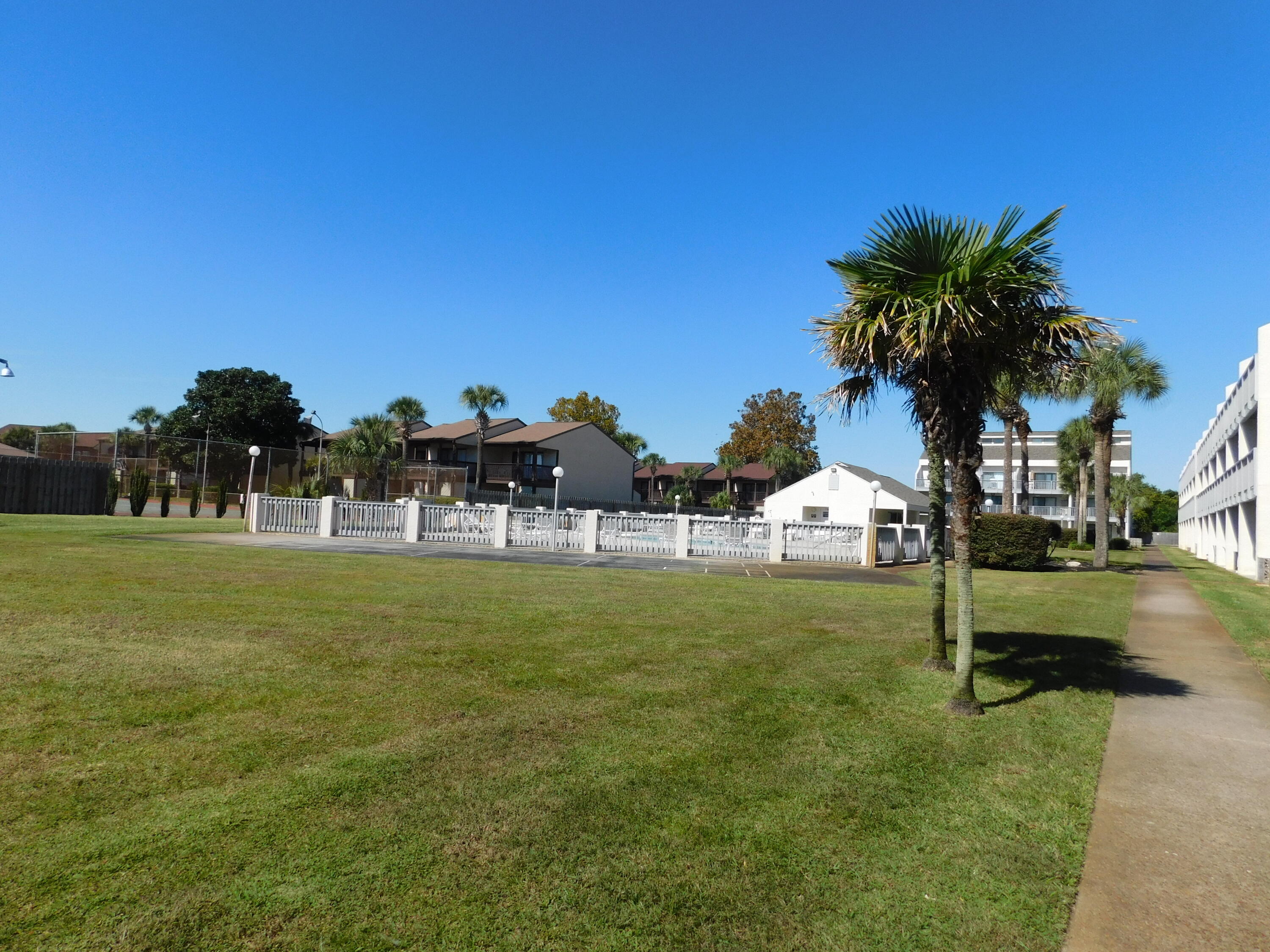 17614 Front Beach Road, Unit A38 Panama City Beach, FL 32413 - Photo 15 of 22 a front view of a house with garden