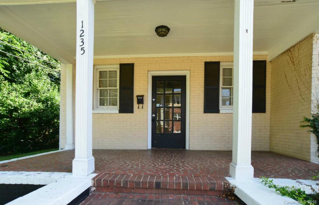1237 Romany Road Charlotte, NC 28203 - Photo 3 of 15 a front view of a house with a porch