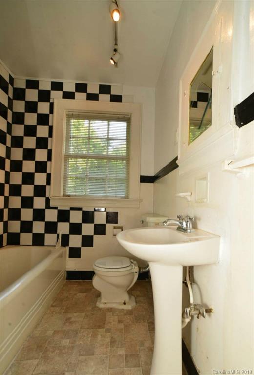 1237 Romany Road Charlotte, NC 28203 - Photo 6 of 15 a bathroom with a sink toilet and mirror