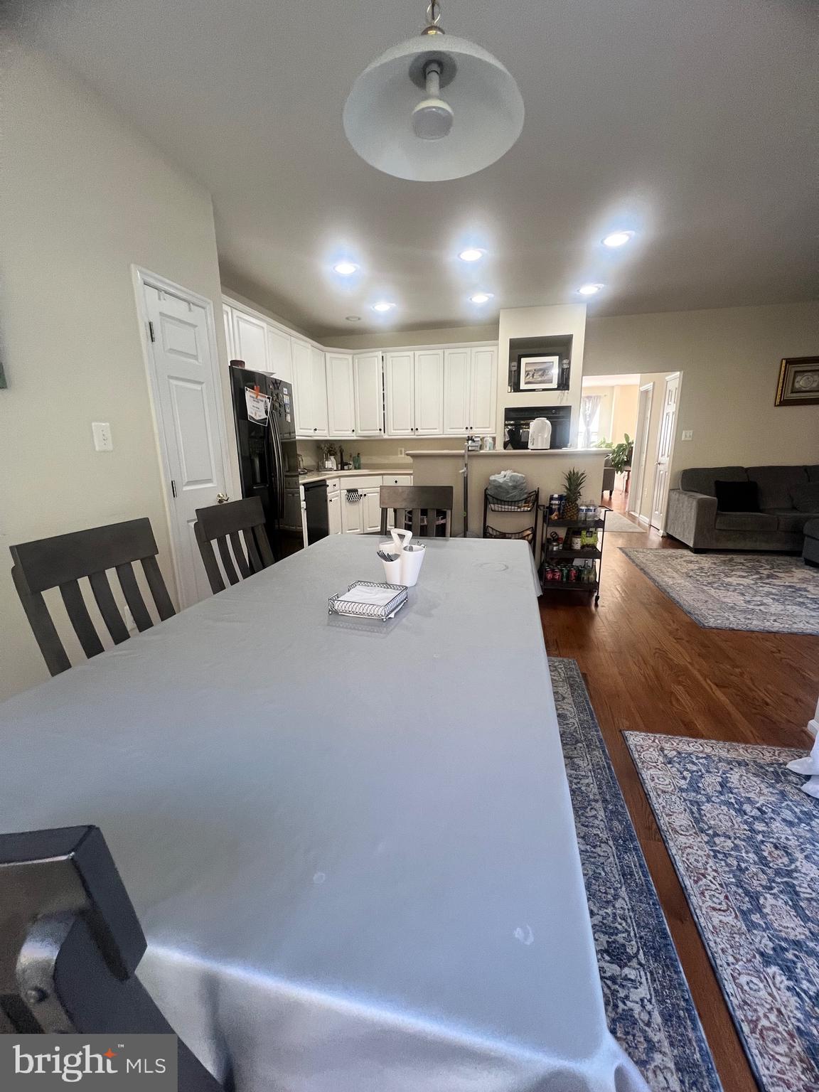 7317 Hampton Manor Place Springfield, VA 22150 - Photo 17 of 38 a large white kitchen with a large window