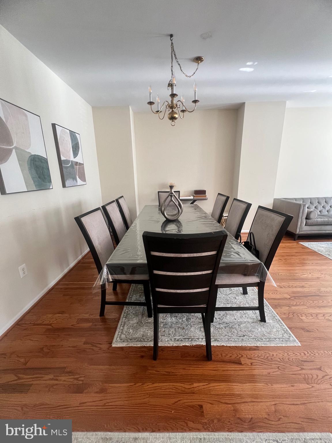 7317 Hampton Manor Place Springfield, VA 22150 - Photo 5 of 38 a living room with furniture and a wooden floor