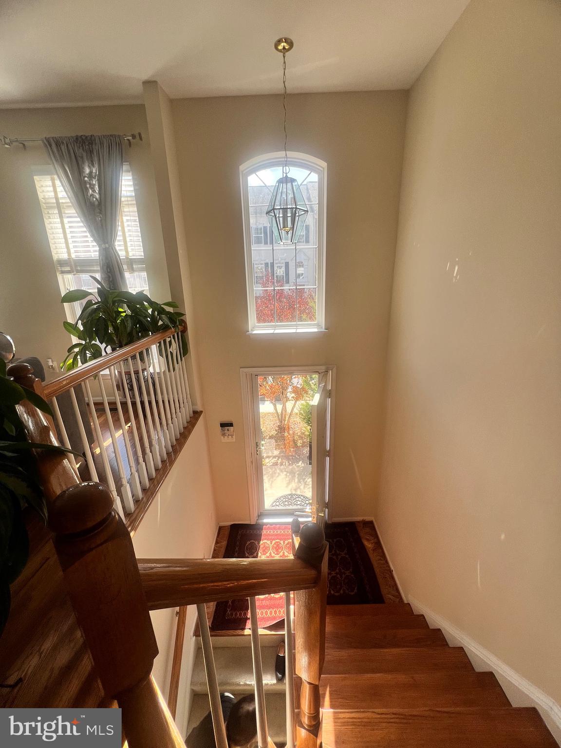 7317 Hampton Manor Place Springfield, VA 22150 - Photo 6 of 38 a view of entryway and hall with wooden floor