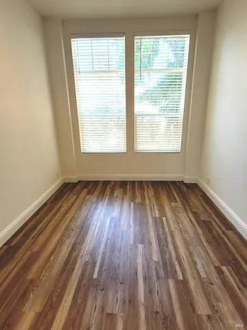 a bathroom with a granite countertop toilet sink and shower