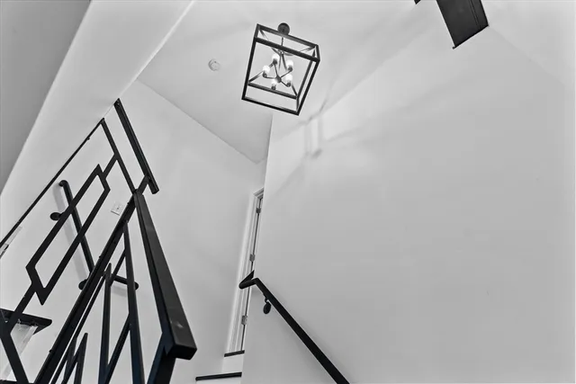 a view of entryway with furniture and wooden floor