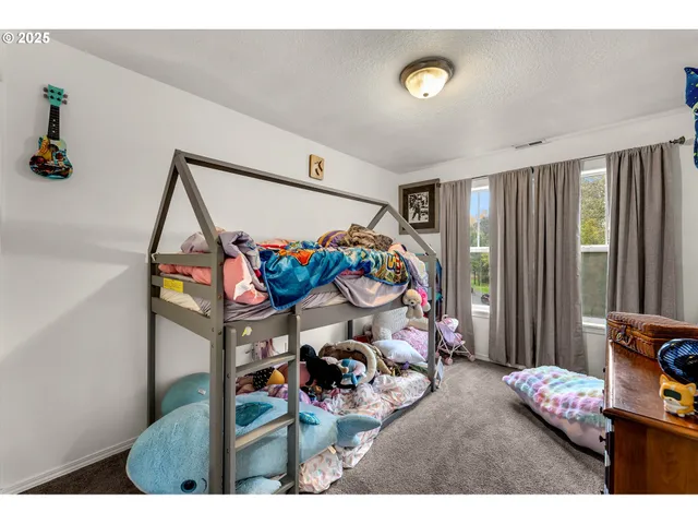 a view of a livingroom with furniture and a couch