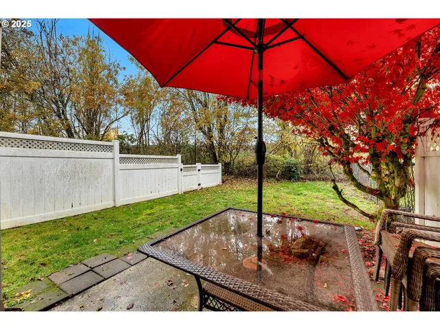 a view of a backyard with a patio