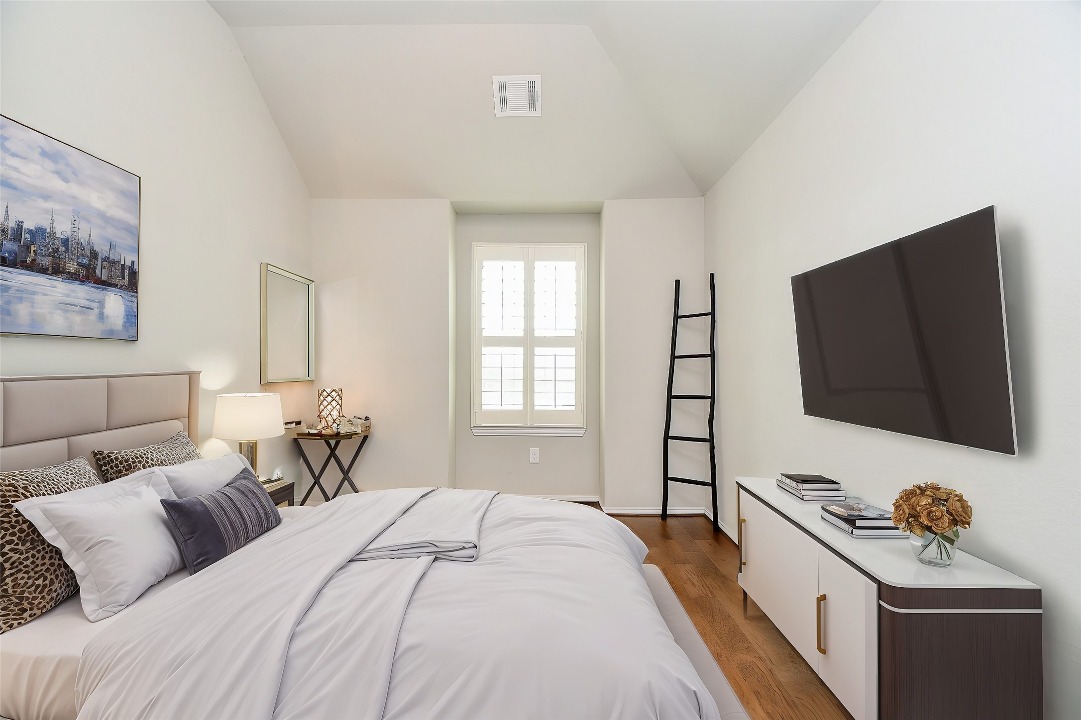 4523 Juniper Ridge Lane Manvel, TX 77578 - Photo 30 of 38 a bedroom with a bed and a flat screen tv