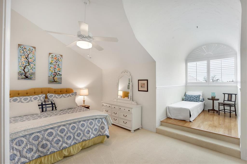 11000 Placida Road, Unit 2103 Placida, FL 33946 - Photo 35 of 63 a bedroom with furniture and windows