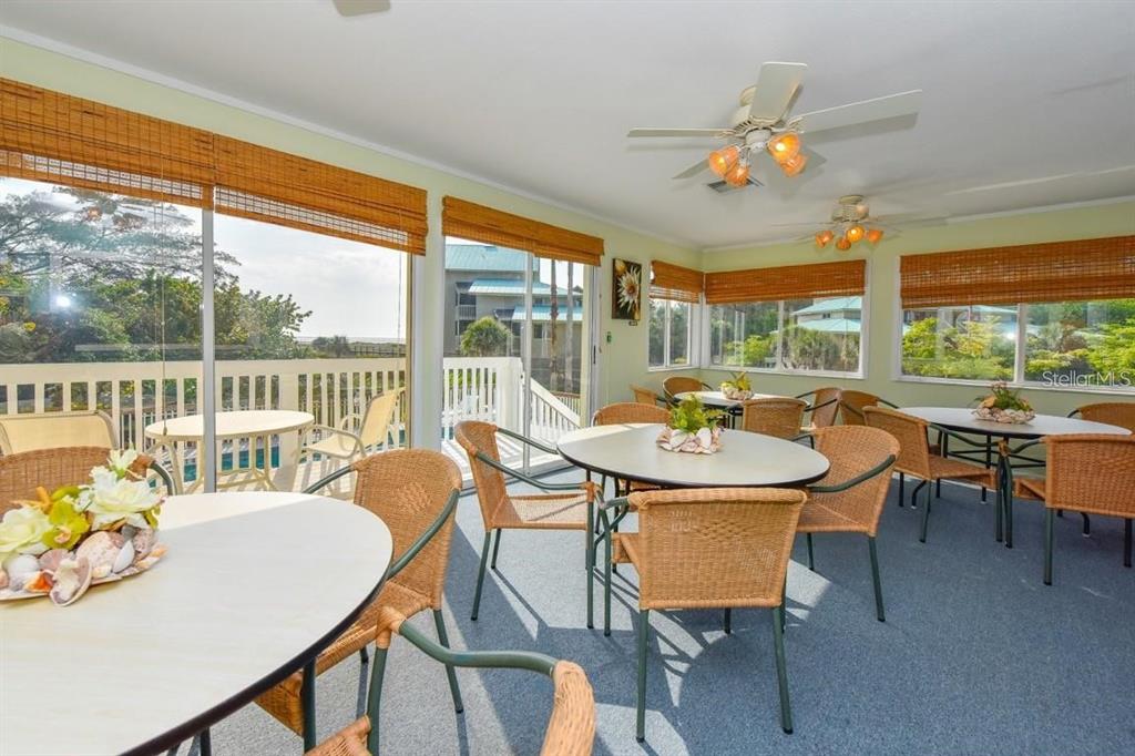 11000 Placida Road, Unit 2103 Placida, FL 33946 - Photo 52 of 63 a view of a dining room with furniture window and outside view