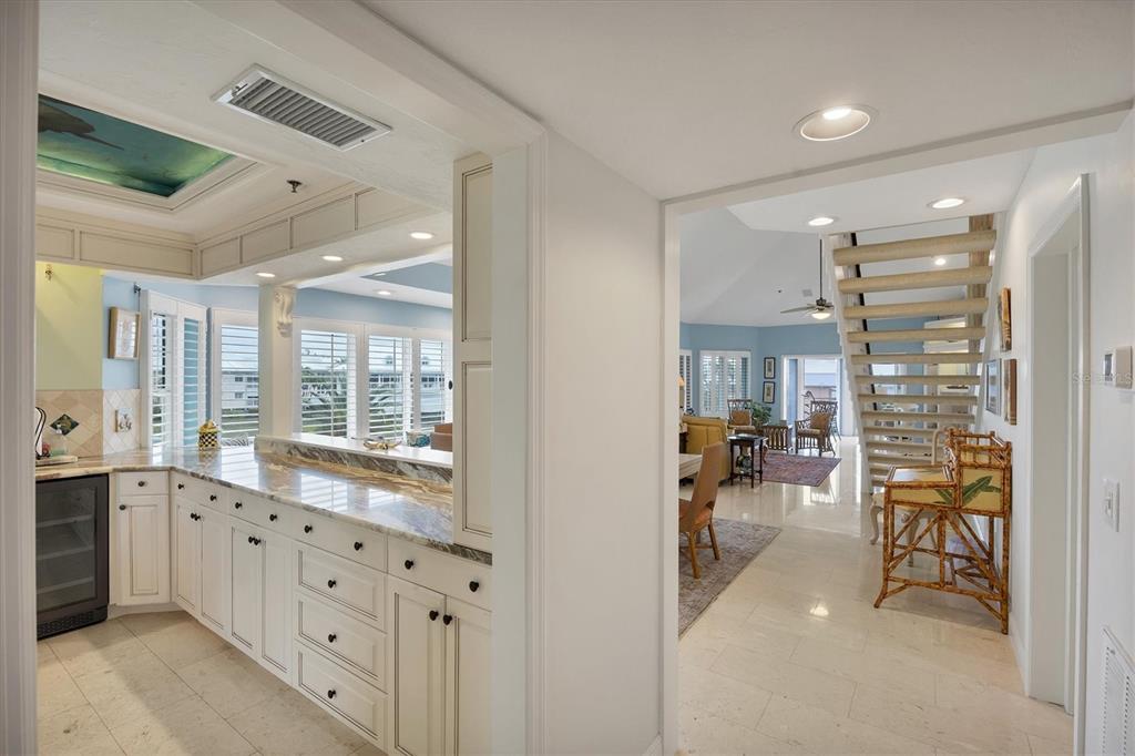 11000 Placida Road, Unit 2103 Placida, FL 33946 - Photo 6 of 63 a very nice looking room with many windows and chairs