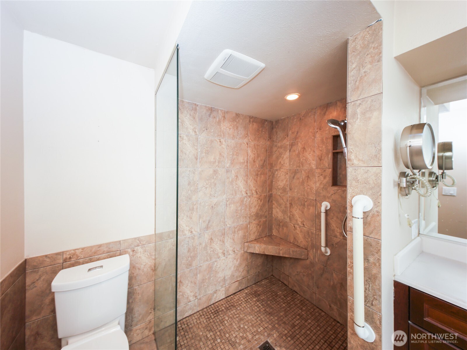 3413 Alaska Road Brier, WA 98036 - Photo 14 of 26 a bathroom with a shower a toilet and sink