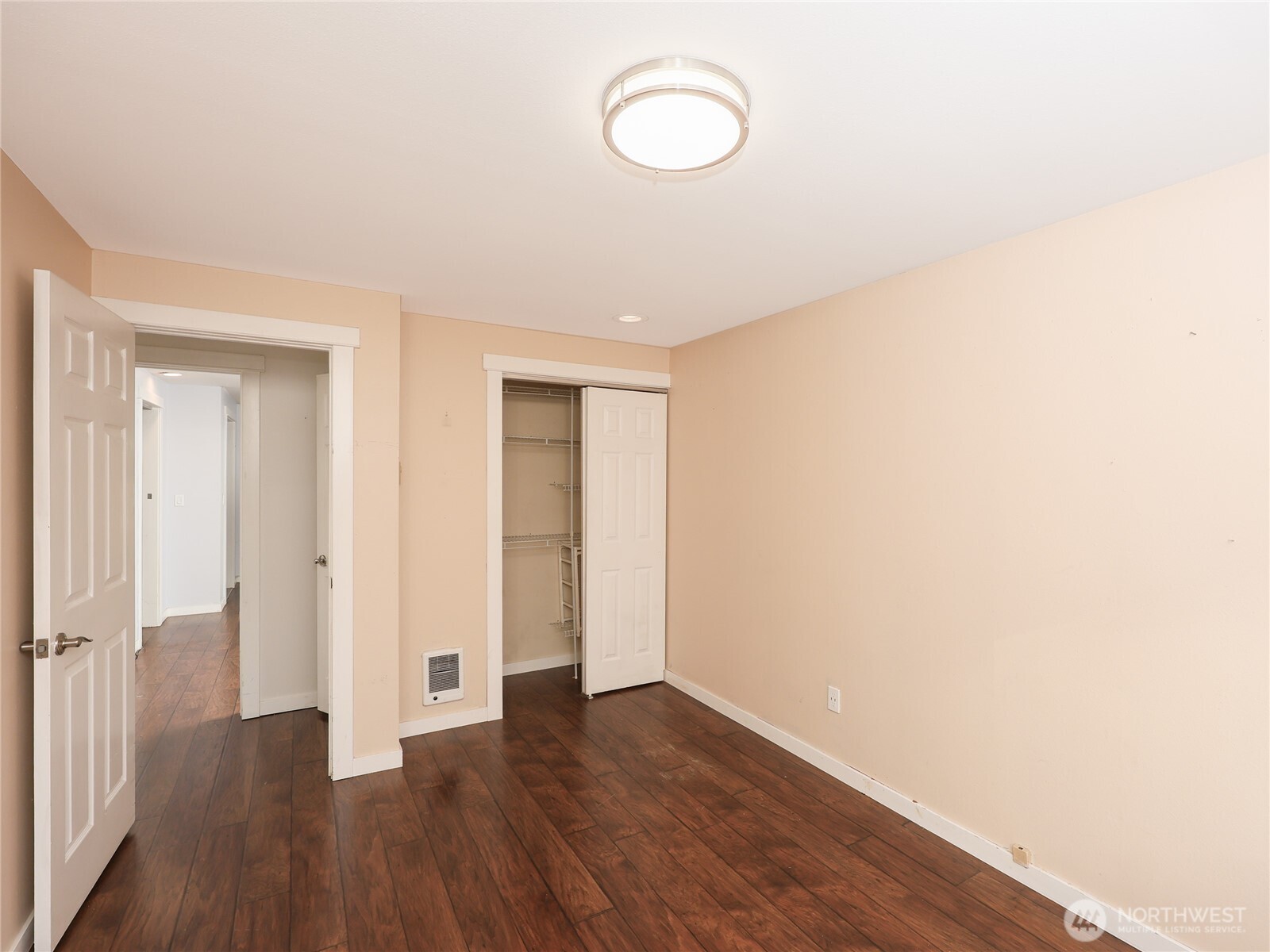 3413 Alaska Road Brier, WA 98036 - Photo 17 of 26 a view of a room with wooden floor