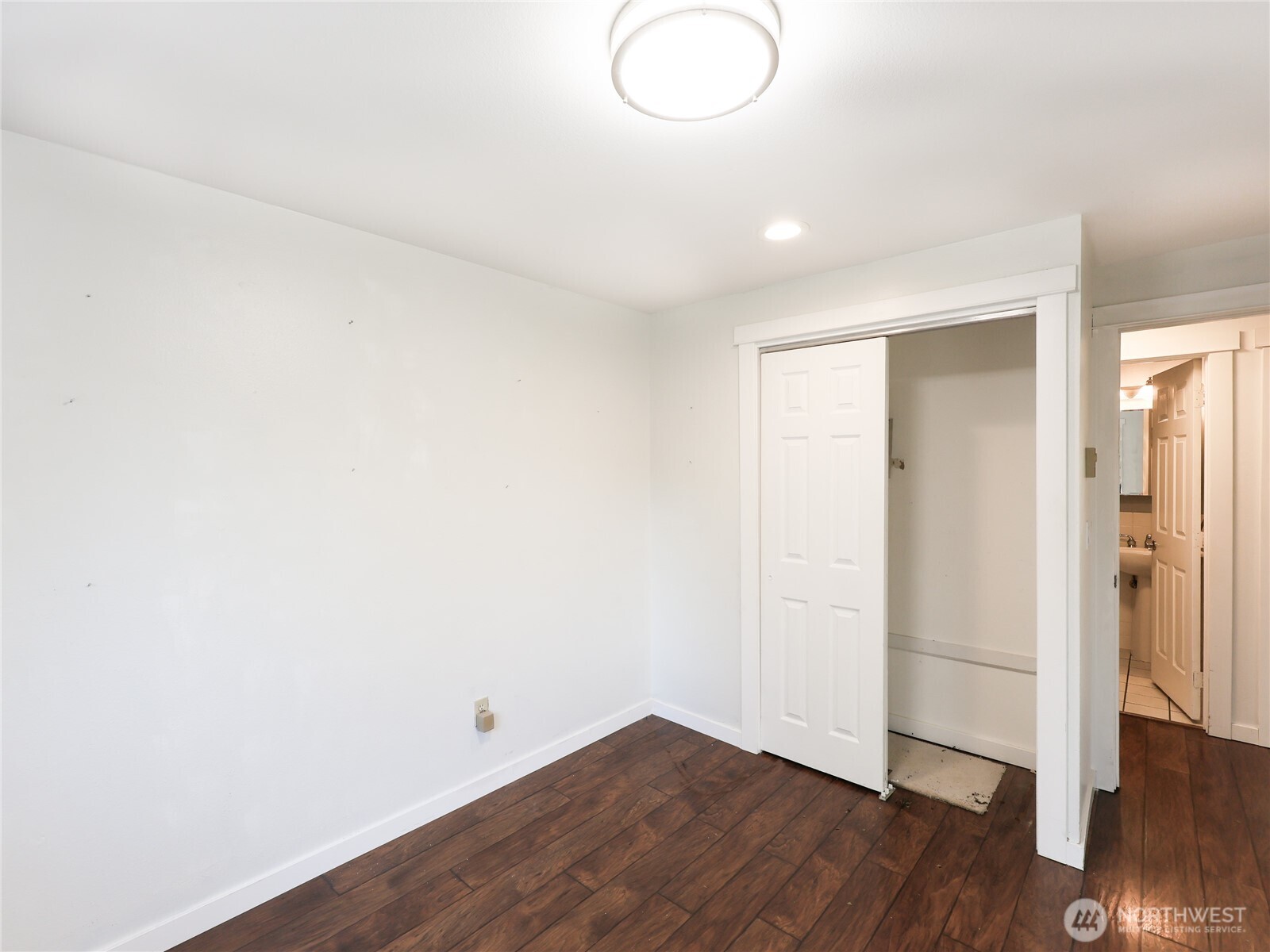 3413 Alaska Road Brier, WA 98036 - Photo 21 of 26 a view of a room with wooden floor