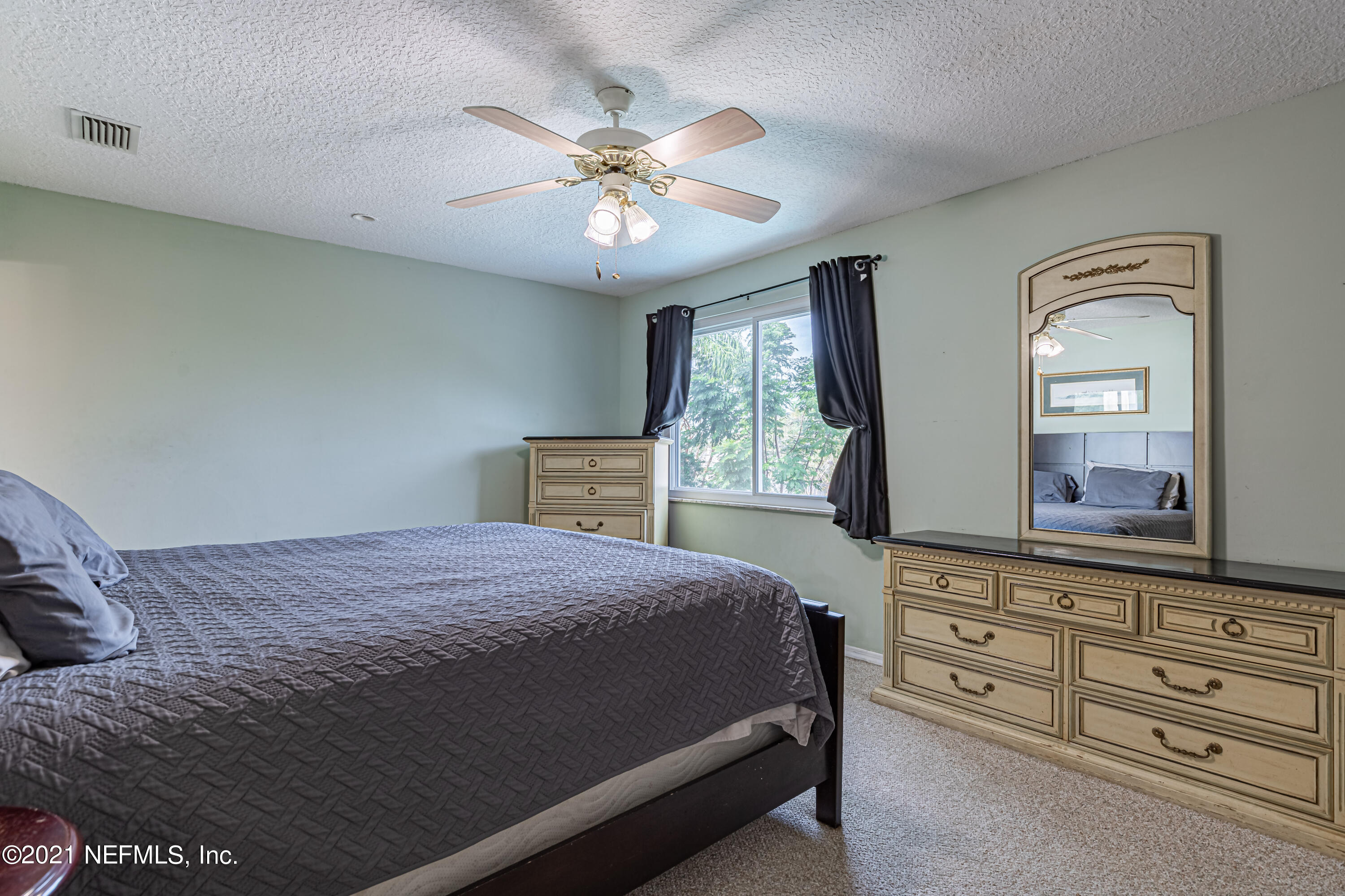 6005 Briar Forest Road North Jacksonville, FL 32277 - Photo 25 of 32 15 Master Bedroom