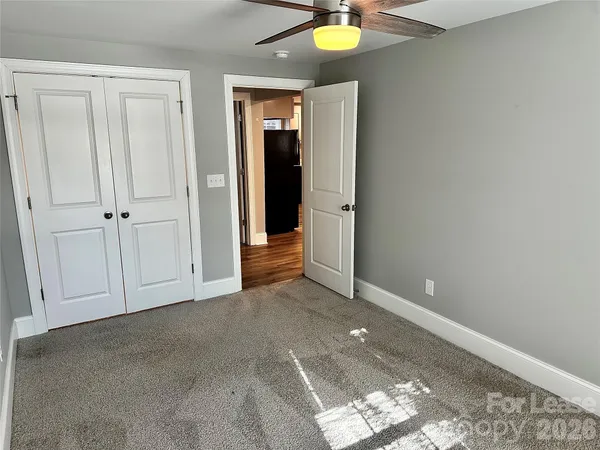 an empty room with window