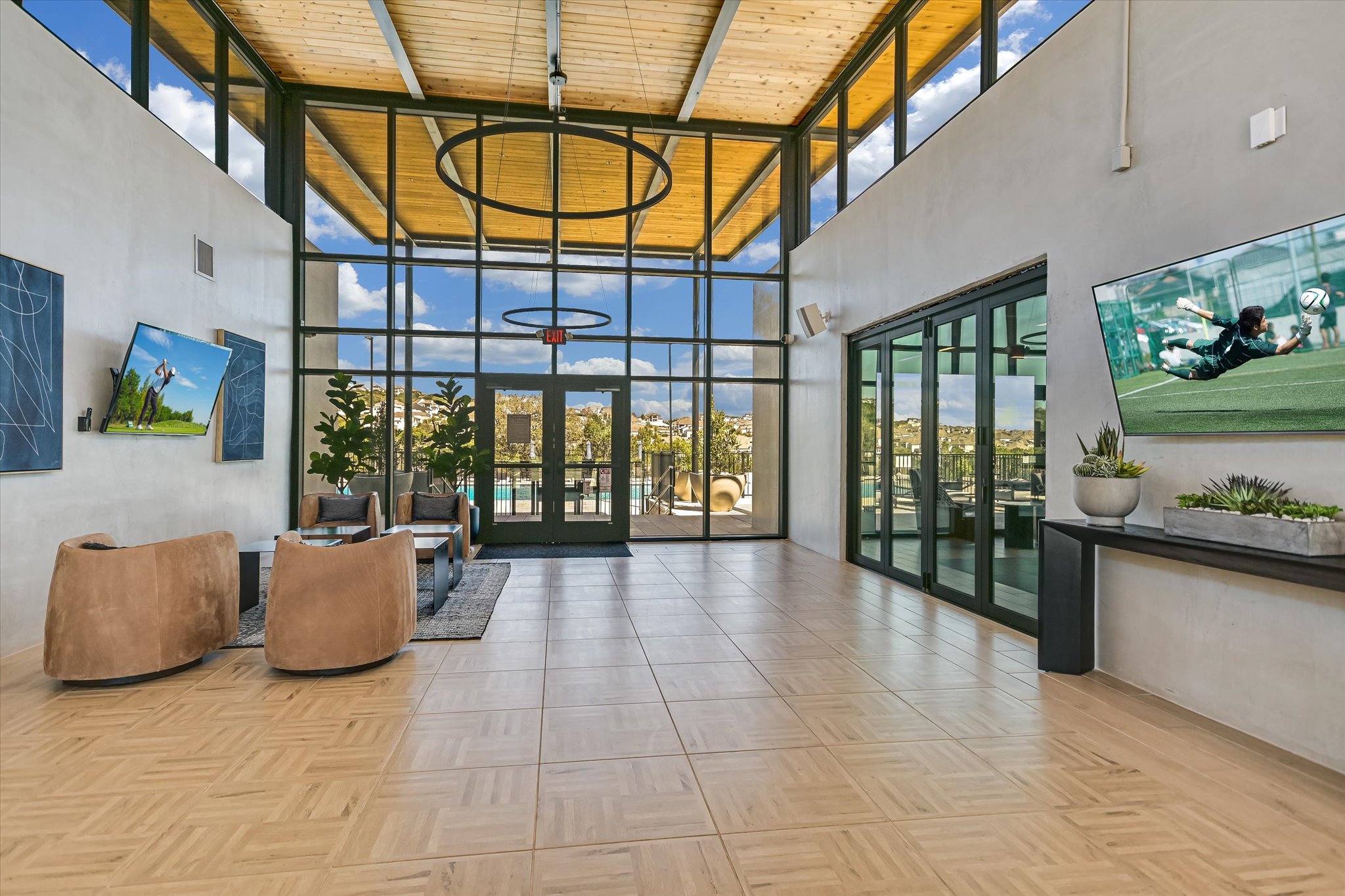 1928 Varese Path Leander, TX 78641 - Photo 23 of 31 a lobby with furniture and floor to ceiling window