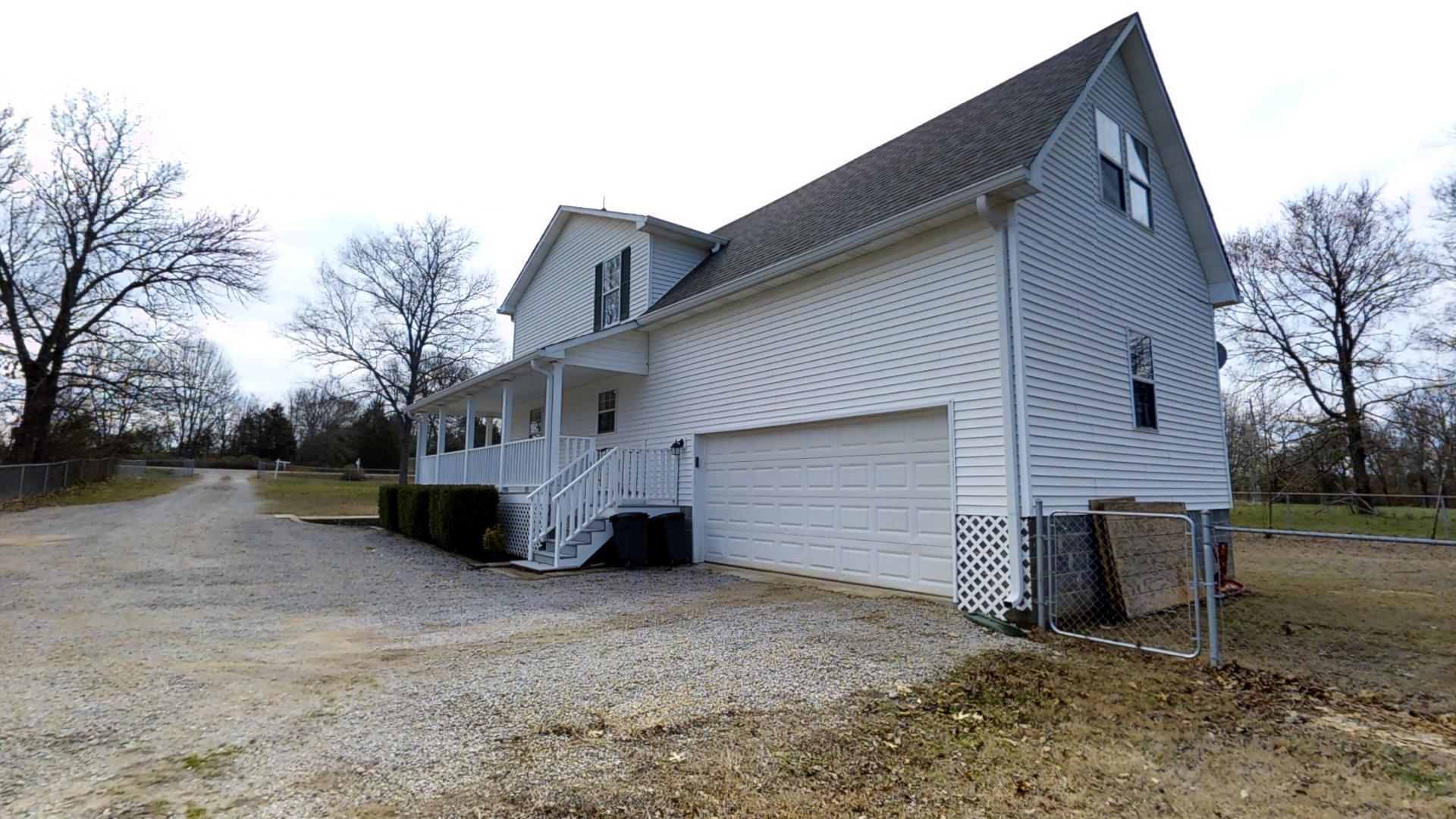 4811 Joe Peay Road Spring Hill, TN 37174 - Photo 3 of 19 a view of a house with a yard