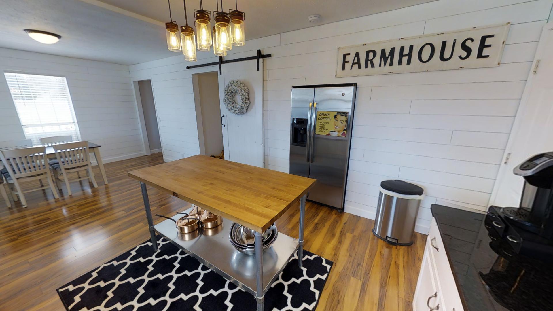 4811 Joe Peay Road Spring Hill, TN 37174 - Photo 6 of 19 a dining room with furniture and wooden floor