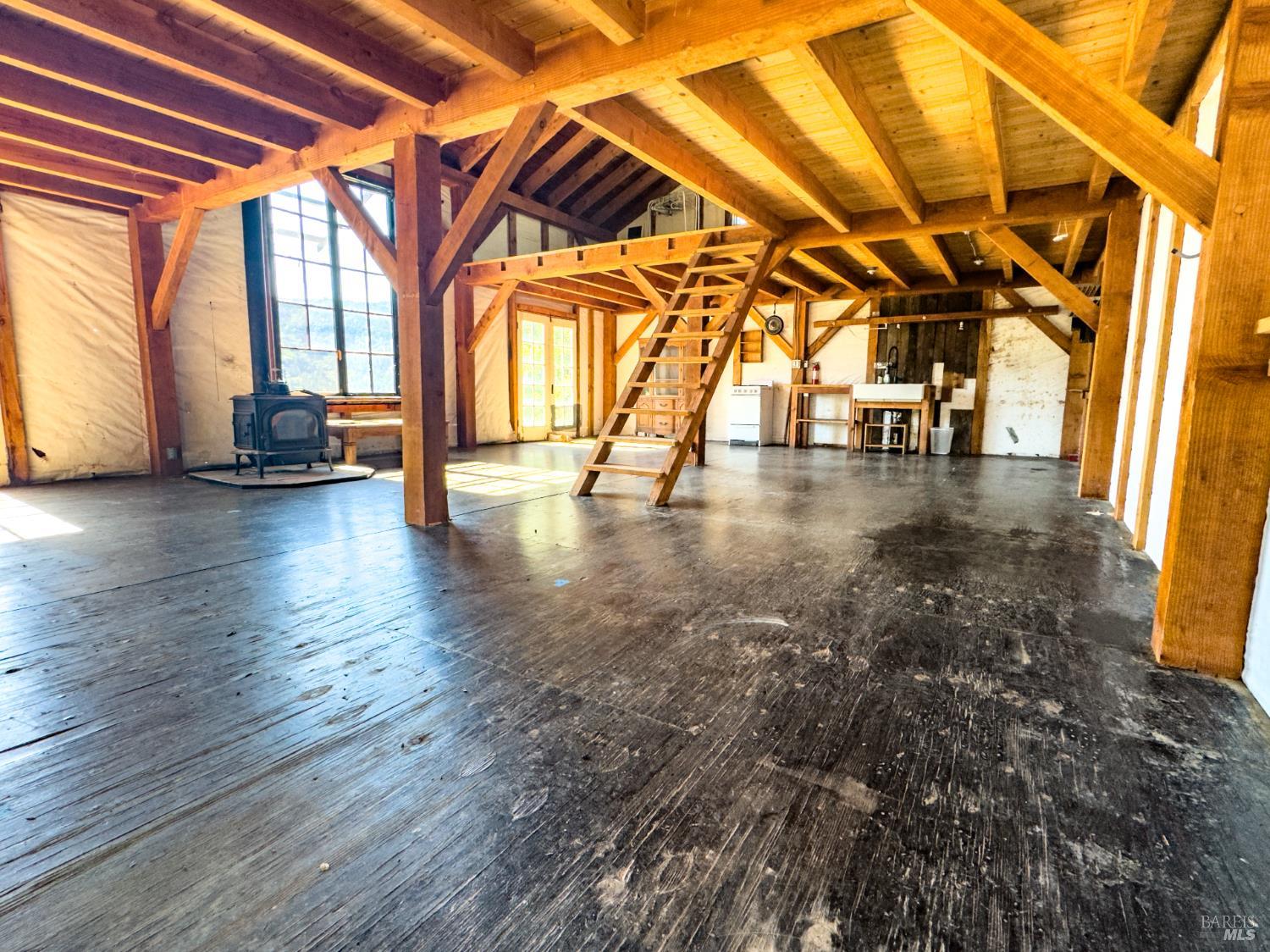 1510 Boonville Road Ukiah, CA 95482 - Photo 11 of 26 a view of a room with wooden floor and door