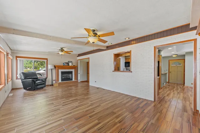 a view of livingroom with furniture and fireplace