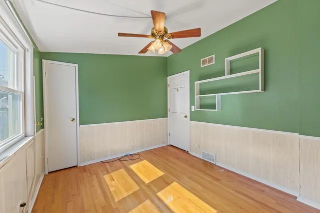 a bathroom with a shower and a sink