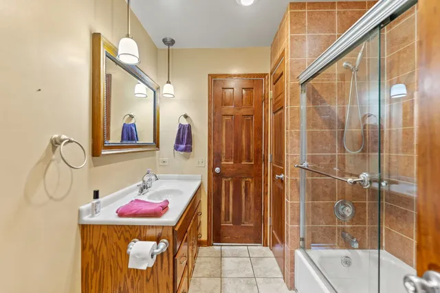 a bathroom with a sink a mirror and a toilet