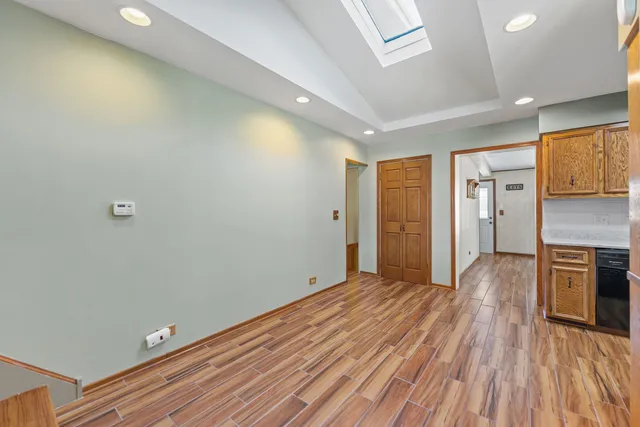 a view of a livingroom with wooden floor