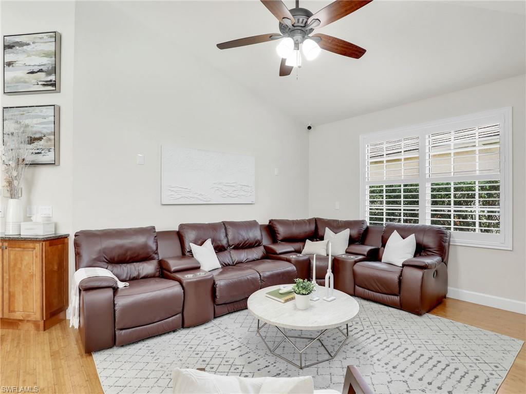 6862 Mill Run Road Naples, FL 34109 - Photo 21 of 50 Bedroom featuring ceiling fan, vaulted ceiling, and light hardwood / wood-style floors