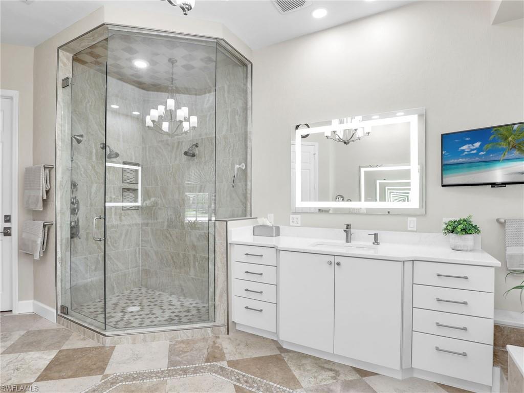 6862 Mill Run Road Naples, FL 34109 - Photo 27 of 50 Bedroom with ceiling fan and light wood-type flooring