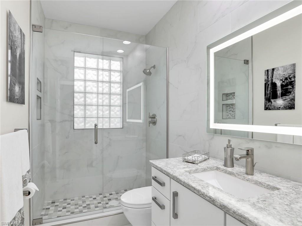 6862 Mill Run Road Naples, FL 34109 - Photo 35 of 50 Bedroom with ceiling fan and wood-type flooring