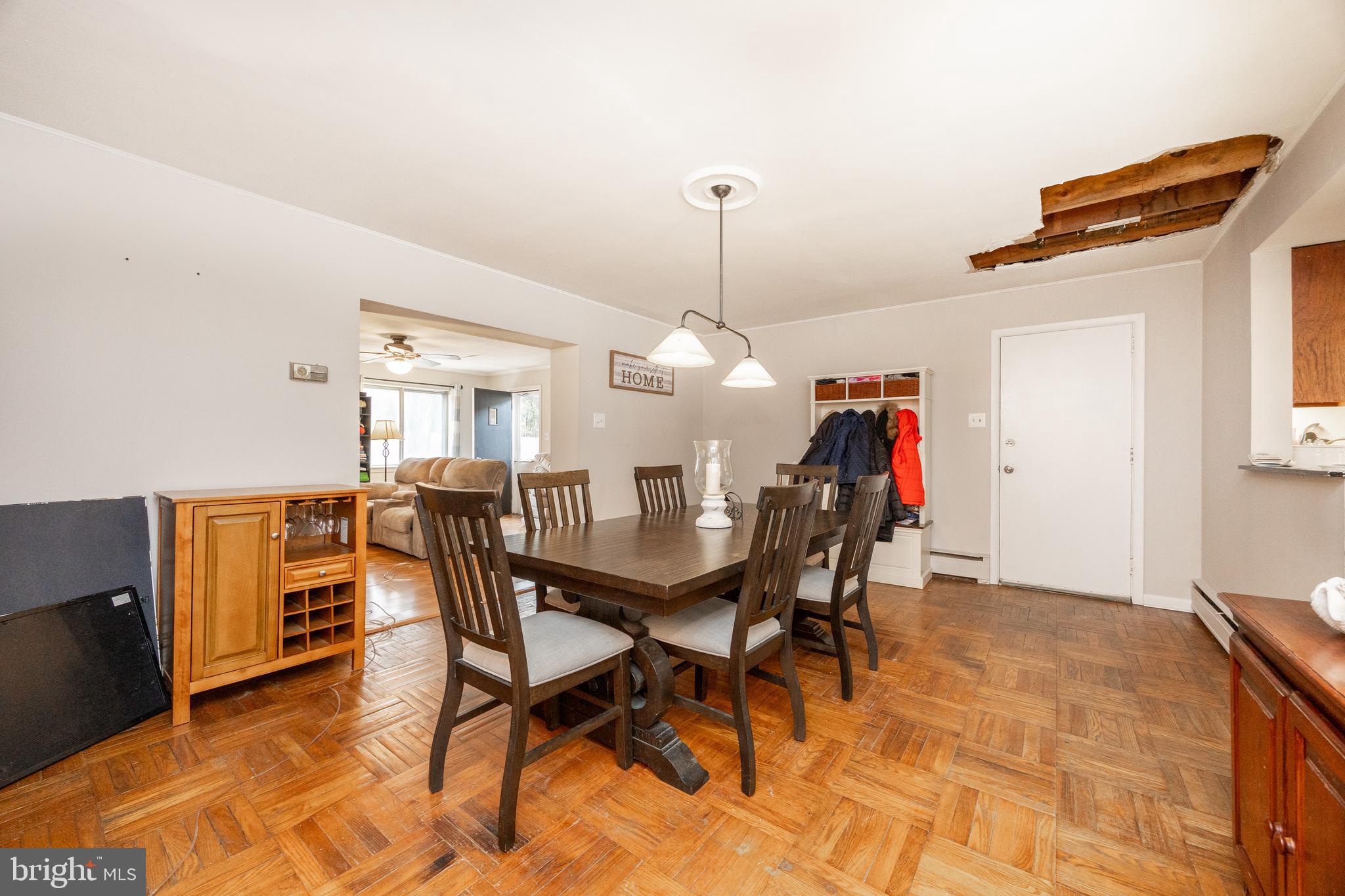 149 Conestoga Road Malvern, PA 19355 - Photo 13 of 43 a view of a dining room with furniture and wooden floor