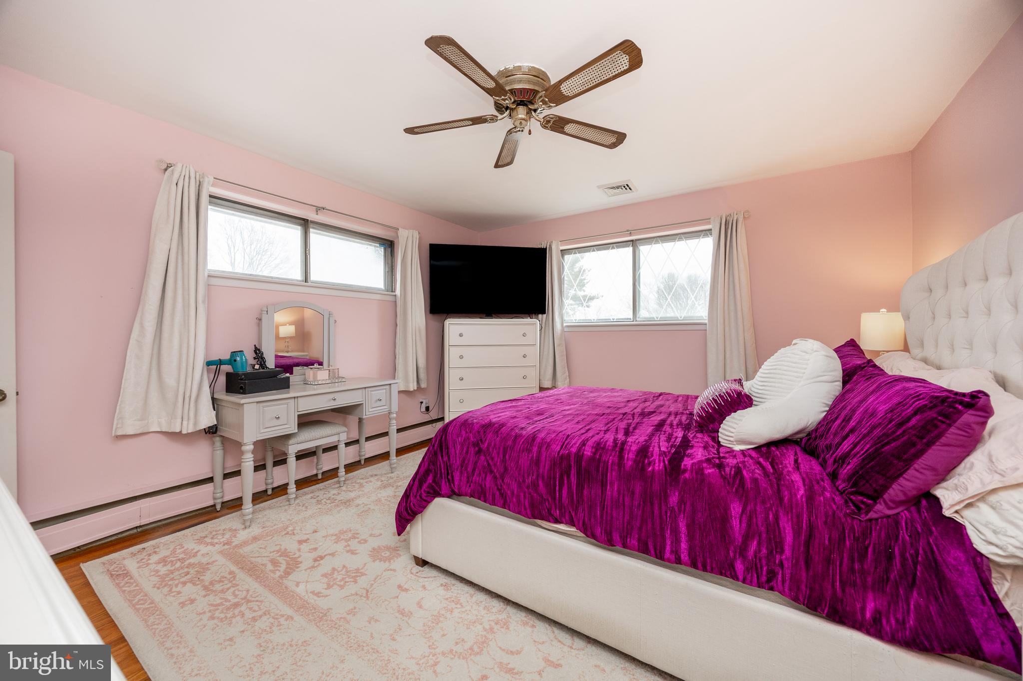 149 Conestoga Road Malvern, PA 19355 - Photo 19 of 43 a bedroom with a large bed and a window