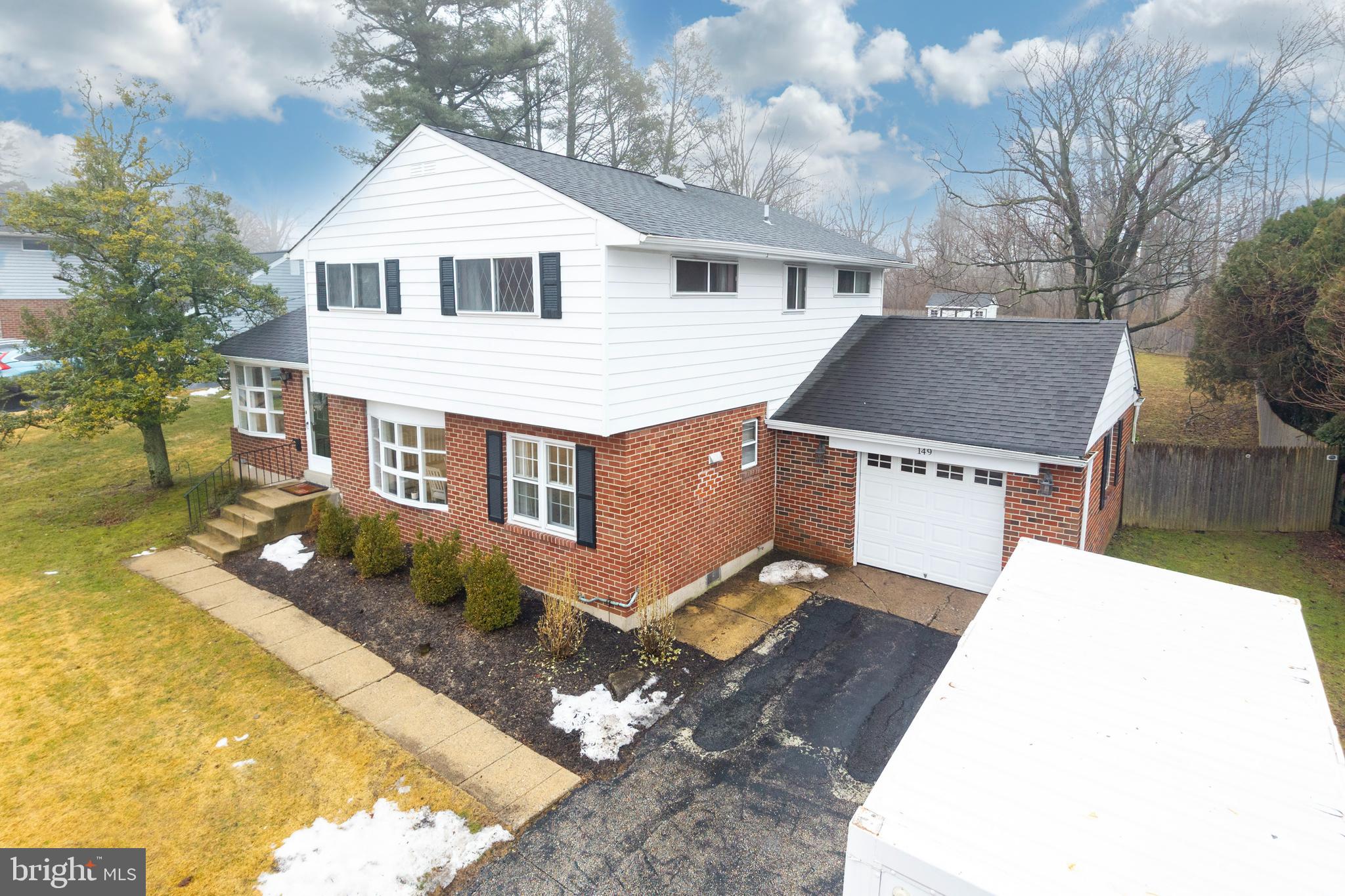 149 Conestoga Road Malvern, PA 19355 - Photo 3 of 43 a view of a house with a yard