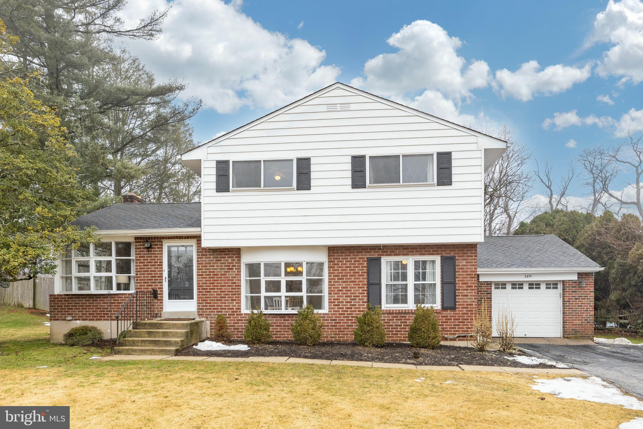 149 Conestoga Road Malvern, PA 19355 - Photo 33 of 43 a front view of a house with a yard