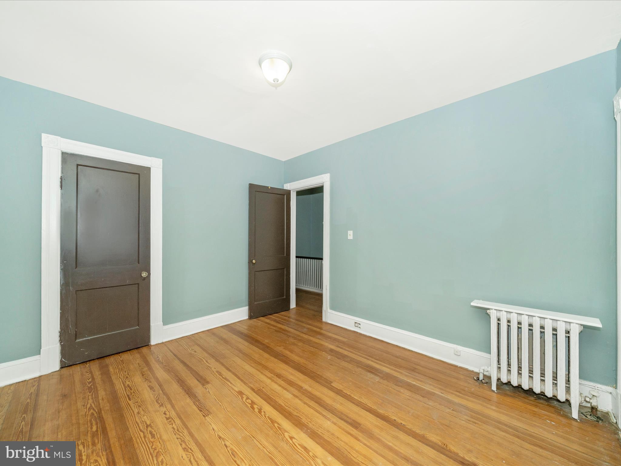 4818 7th Street Northwest Washington, DC 20011 - Photo 20 of 31 a view of a room with wooden floor