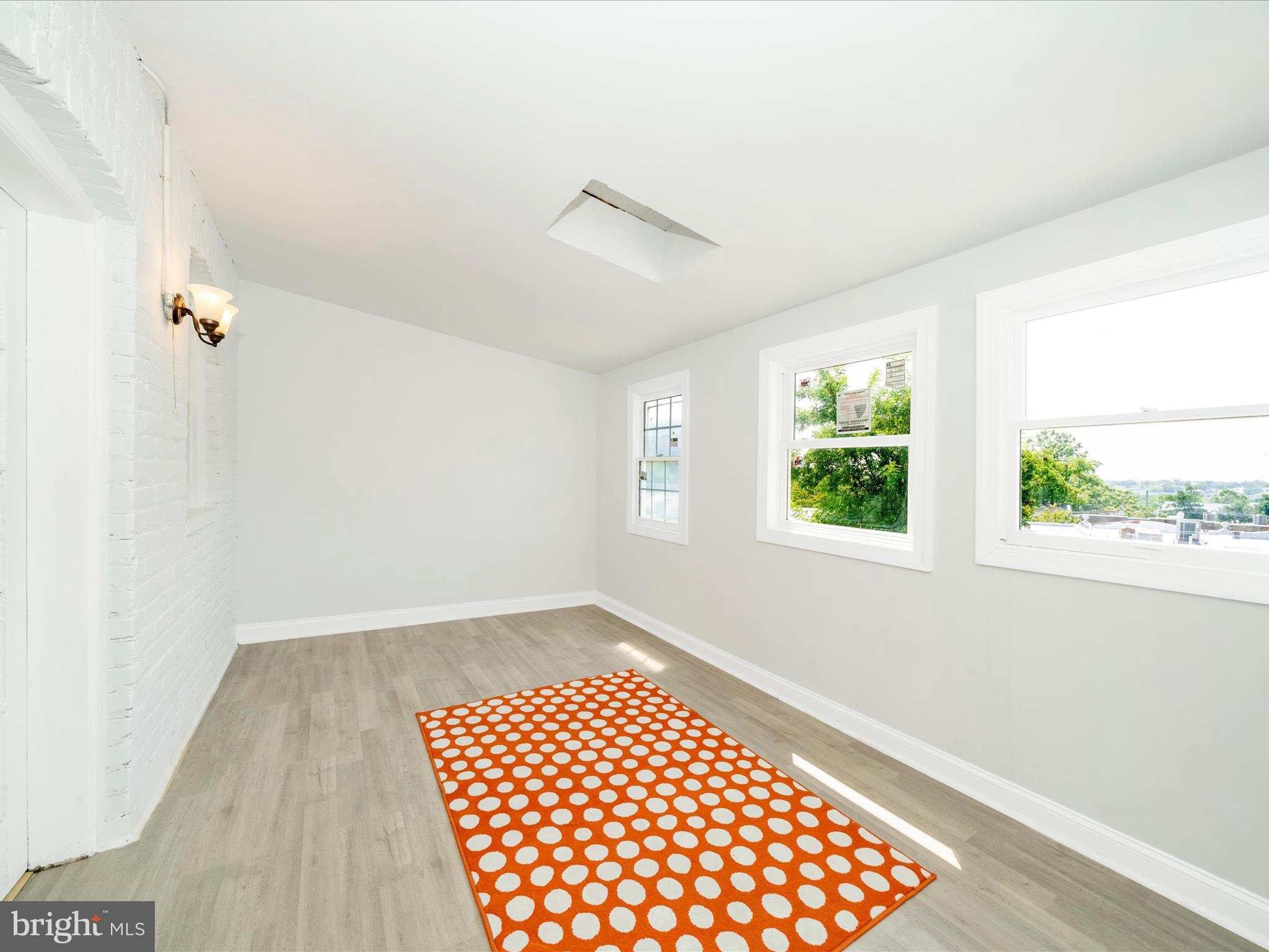 4818 7th Street Northwest Washington, DC 20011 - Photo 23 of 31 a view of wooden floor in a room