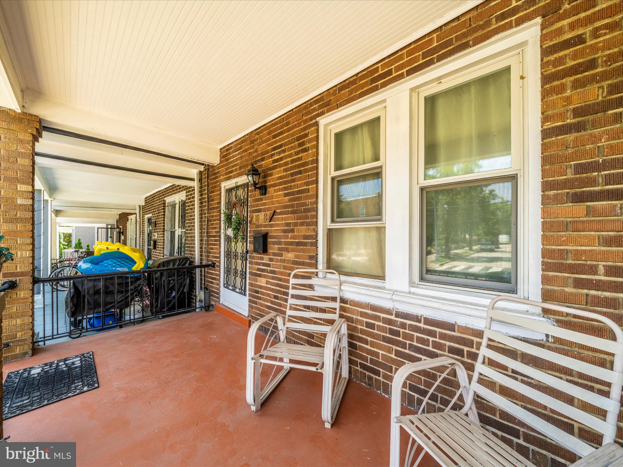 4818 7th Street Northwest Washington, DC 20011 - Photo 30 of 31 a backyard of a house with barbeque oven table and chairs