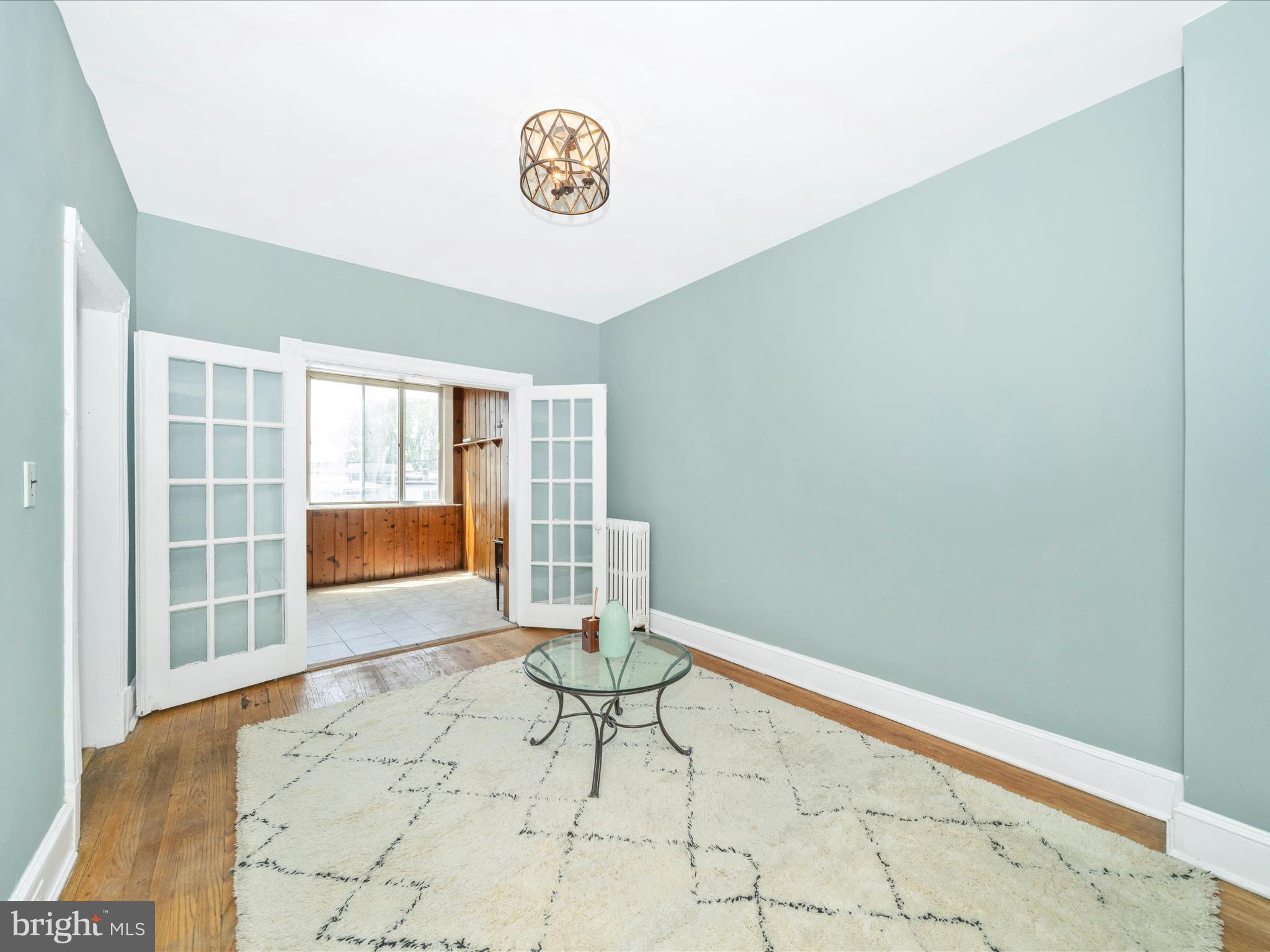 4818 7th Street Northwest Washington, DC 20011 - Photo 4 of 31 a view of wooden floor and workspace in a room