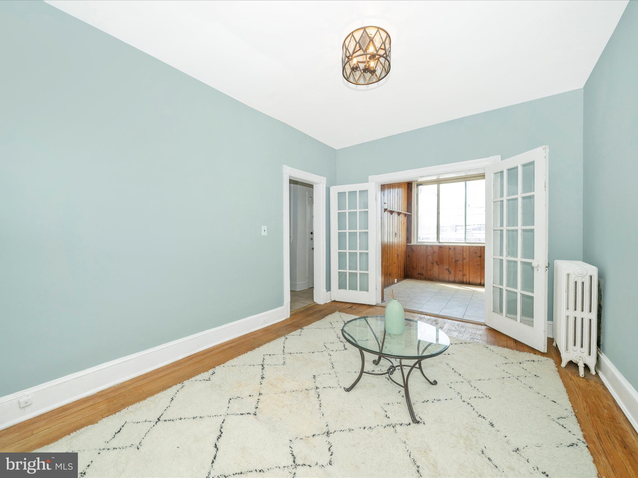 4818 7th Street Northwest Washington, DC 20011 - Photo 5 of 31 a view of a livingroom with furniture and a window