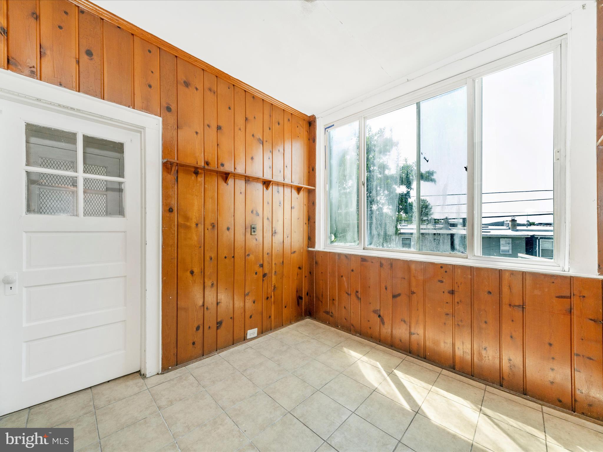 4818 7th Street Northwest Washington, DC 20011 - Photo 7 of 31 an empty room with windows