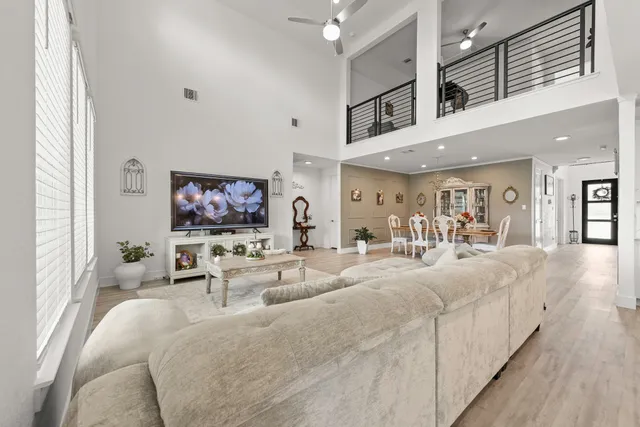 a large white bed in a hotel room