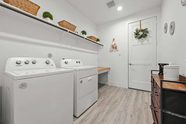 a utility room with washer and dryer