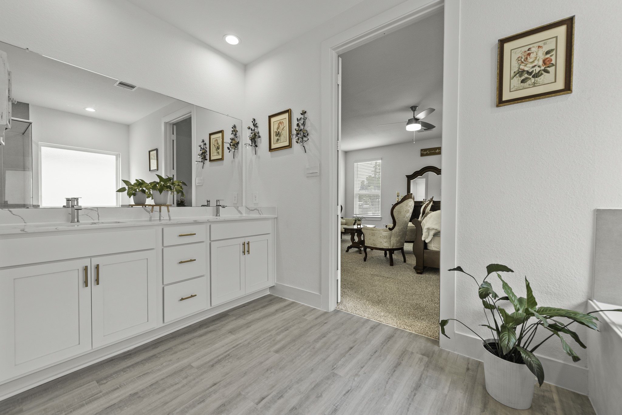 14130 Savage River Conroe, TX 77384 - Photo 21 of 33 a living room with furniture and a wooden floor