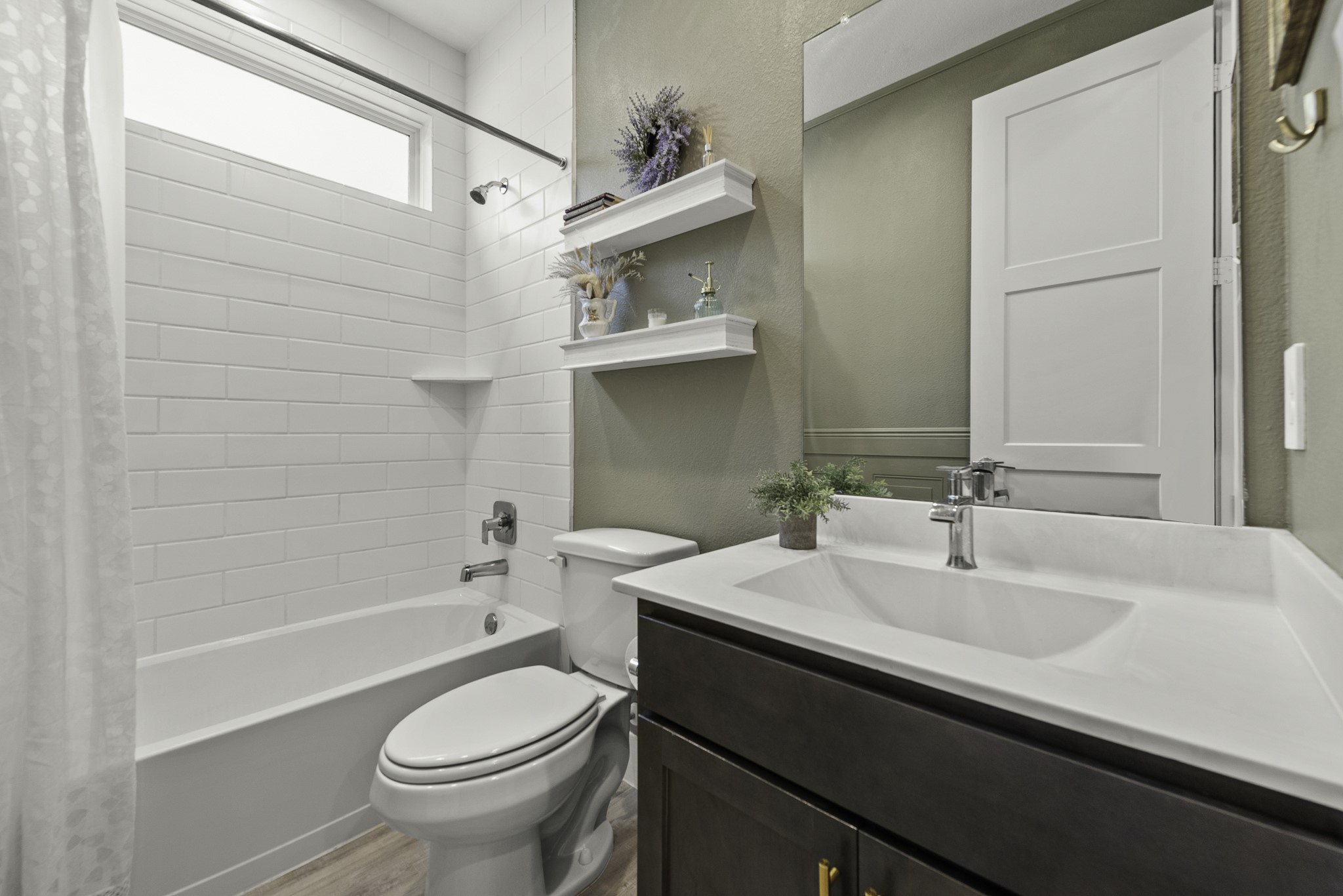 14130 Savage River Conroe, TX 77384 - Photo 24 of 33 a bathroom with a sink a toilet and shower