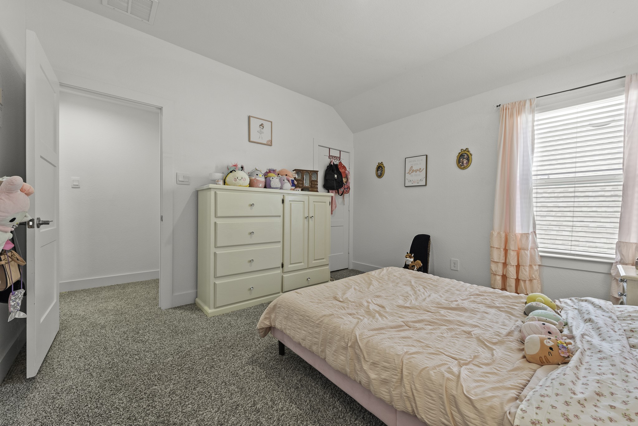 14130 Savage River Conroe, TX 77384 - Photo 26 of 33 a bedroom with a bed and a cabinets