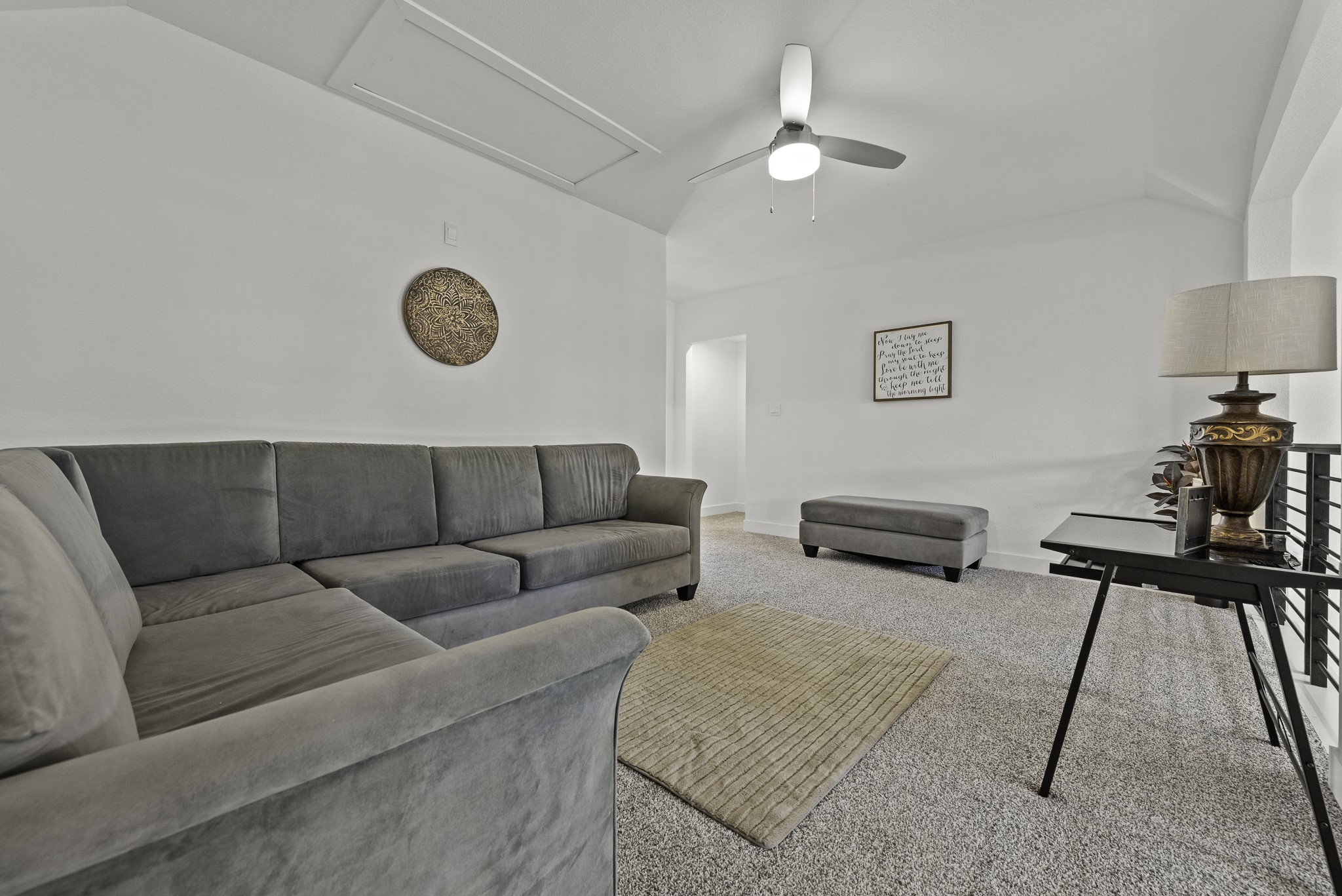 14130 Savage River Conroe, TX 77384 - Photo 27 of 33 a living room with furniture and a table