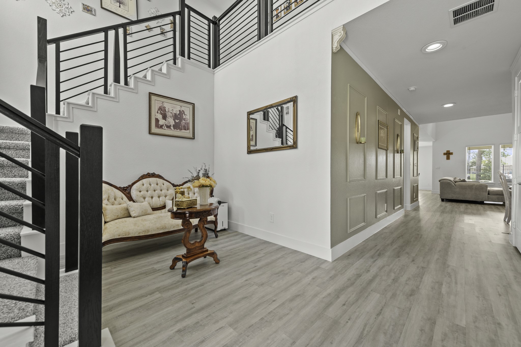 14130 Savage River Conroe, TX 77384 - Photo 3 of 33 a view of a livingroom with furniture and a ceiling fan