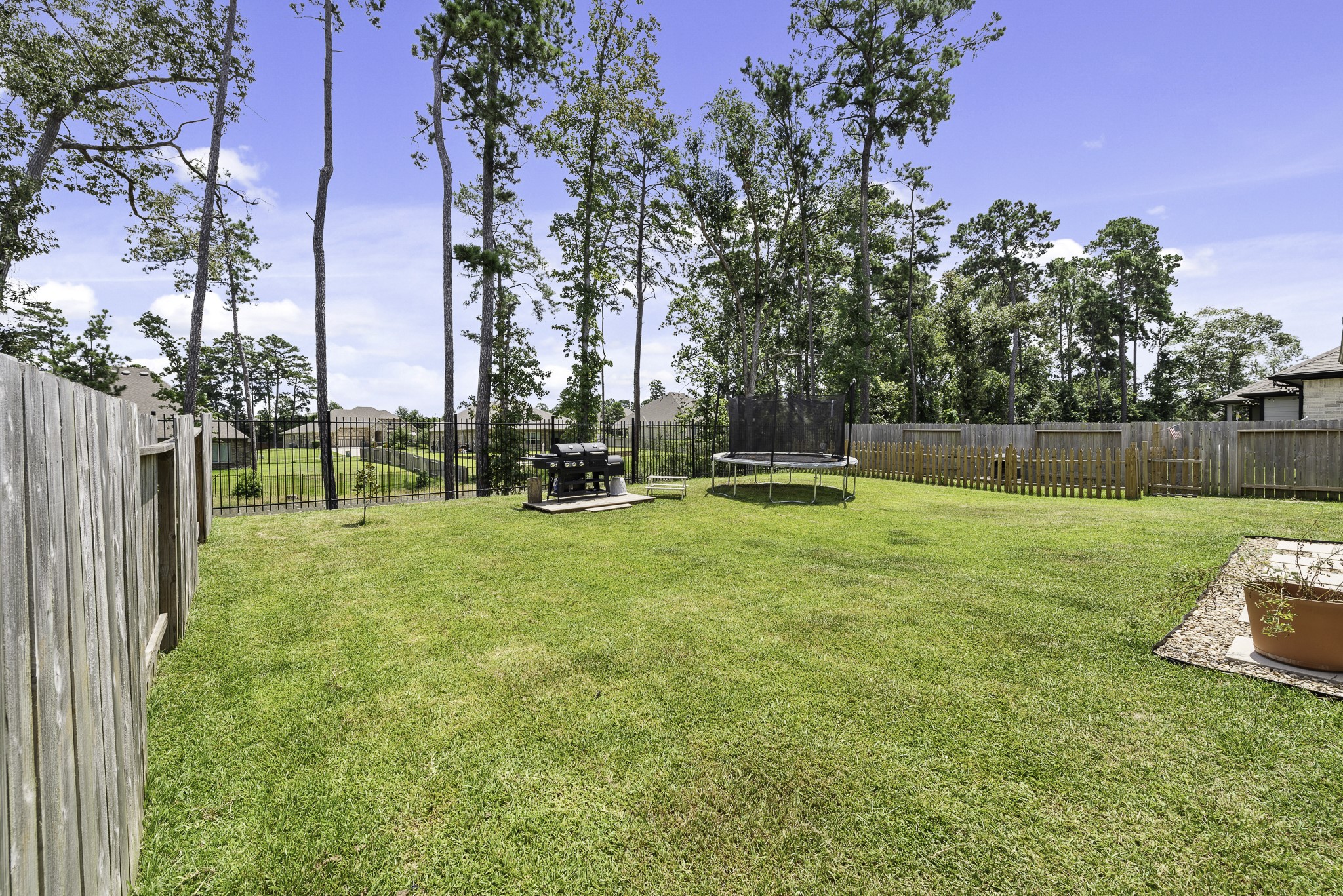 14130 Savage River Conroe, TX 77384 - Photo 31 of 33 a view of a park with large trees