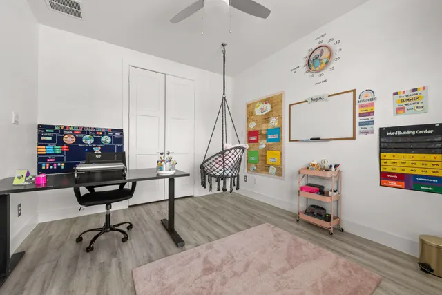 a view of a workspace with furniture